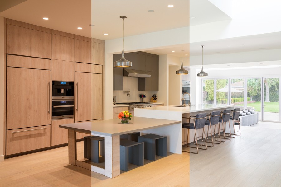 Combined living room and dining space area with luxury chandeliers above the dining table.