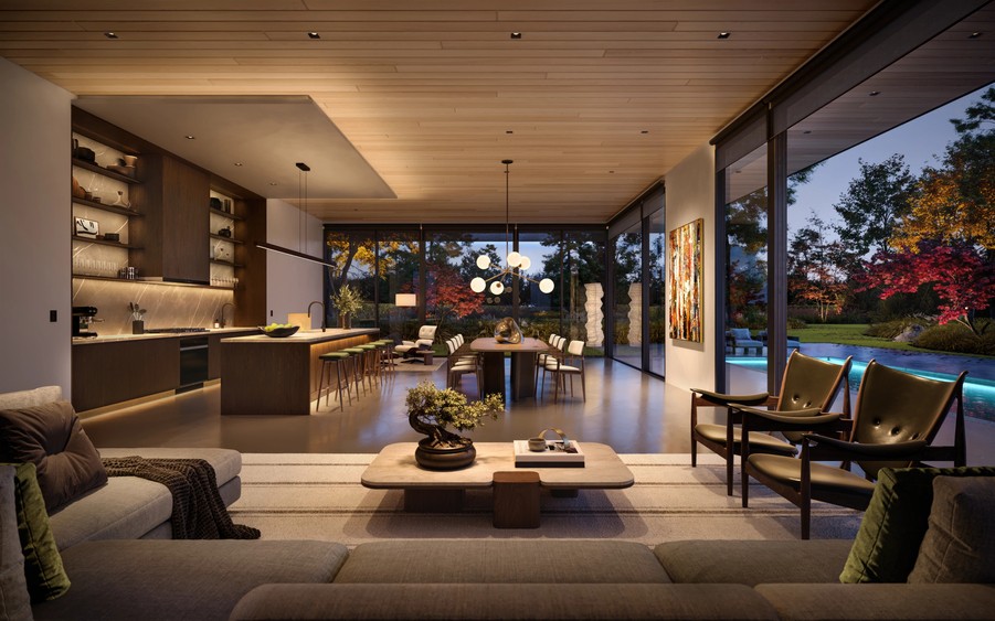 A home with an open-floor plan softly illuminated by Lutron lighting. Lutron’s motorized shades cover the top of the windows.